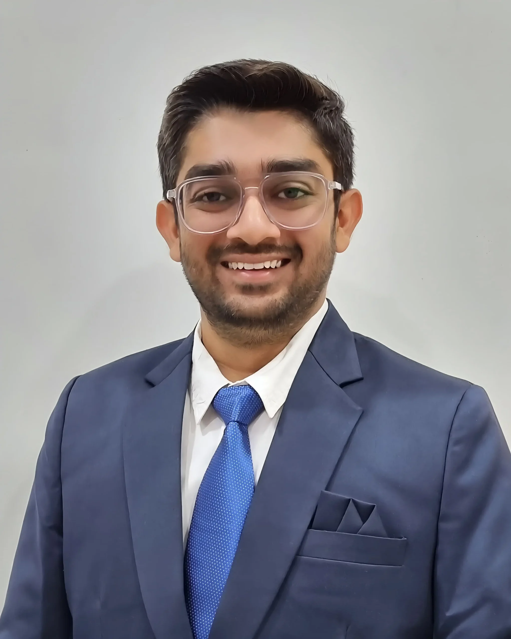 Best Psychiatrist in Ahmedabad – Dr. Dharmik Ahir consulting a patient at Bliss Hospital, Bapunagar